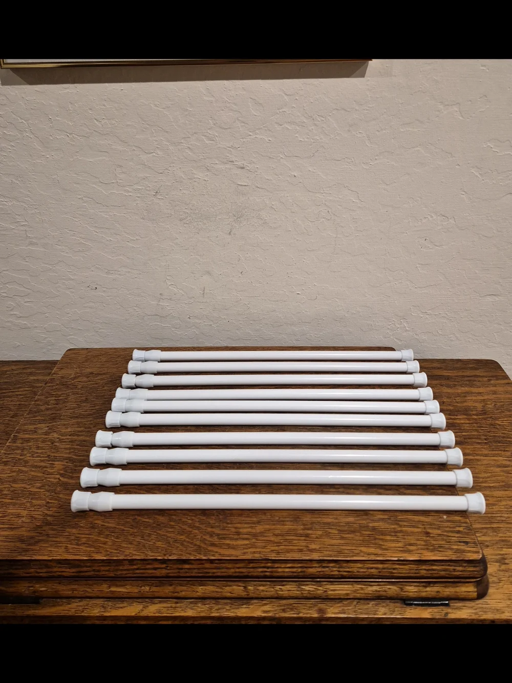 Set of 10 White Adjustable Spring Tension Curtain rods. 16